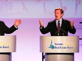 Doug Ford, John Tory, and Olivia Chow (not pictured) take part in a debate hosted by the Toronto Real Estate Board on Tuesday, Oct. 21, 2014. (MICHAEL PEAKE/Toronto Sun)
