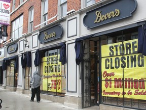 Dover's Men's Wear on Princess Street will be closing at the end of January. The closure is blamed on changing shopping habits, ongoing downtown street construction, high rent and parking issues. (Michael Lea/The Whig-Standard)
