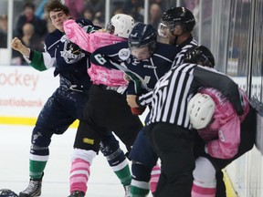 Plymouth Whalers defenceman Mitch Jones (6) tangles with Kingston Frontenacs defenceman Reagan O'Grady (89) after Jones hit Frontenacs rookie Ted Nichol in the head during OHL action in Kingston on Oct. 17. Jones received an eight-game suspension for the hit on Nichol. (Elliot Ferguson/The Whig-Standard)