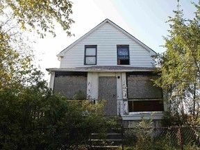 Exterior view of an abandoned house where an unidentified body was found in Gary, Indiana, October 20, 2014. (REUTERS/Jim Young)
