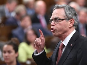 Canada's Finance Minister Joe Oliver speaks during Question Period in the House of Commons on Parliament Hill in Ottawa September 23, 2014. (REUTERS/Chris Wattie)