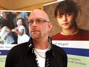 Jayson speaks about Alpha House at a news conference at Santa Maria Goretti Centre in Edmonton, Alberta on Friday, October 21, 2014.  Alpha House is a safe place for clients like Jayson to maintain sobriety. Perry Mah/Edmonton Sun