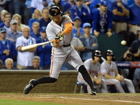 Giants right fielder Hunter Pence hits a two-run home run against the Royals in first inning World Series Game 1 action in Kansas City on Tuesday, Oct. 22, 2014. (Denny Medley/USA TODAY Sports)