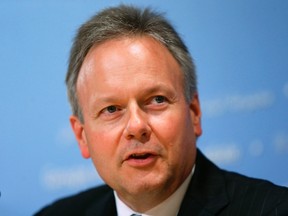 Bank of Canada Governor Stephen Poloz addresses reporters after a meeting of G-20 finance ministers and central bank governors during the IMF-World Bank annual meetings in Washington Oct. 10, 2014.  REUTERS/Jonathan Ernst