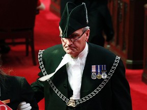 Sergeant-at-Arms Kevin Vickers is pictured in the Senate chamber on Parliament Hill in Ottawa in this file photo from June 3, 2011.  According to Veterans Affairs Minister Julian Fantino, Vickers shot dead one of the suspects in the Oct. 22, 2014 shooting incident on Parliament Hill. (Reuters)