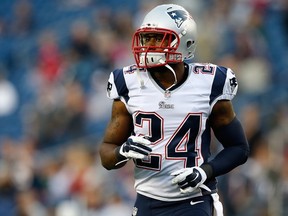 Darrelle Revis #24 of the New England Patriots runs into position during before a game with the Carolina Panthers at Gillette Stadium on August 22, 2014 in Foxboro, Massachusetts. (Jim Rogash/Getty Images/AFP)