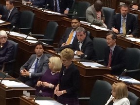 Premier Kathleen Wynne speaks in the legislature on Oct. 22, 2014 about the shooting in Ottawa earlier in the day. (Antonella Artuso/Toronto Sun)