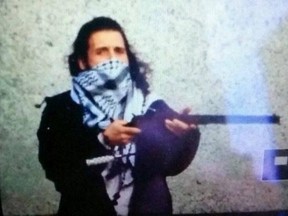 Michael Zehaf-Bibeau, pictured in this image tweeted from an ISIS social media account, has been identified as the shooter of a soldier standing guard at the National War Memorial in Ottawa, Oct. 22, 2014. (Twitter/Handout/QMI Agency)