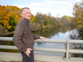 City of London urban designer Jim Yanchula stands on the Wellington Rd, bridge Wednesday over the Thames River where the former South Hospital used to dominate the skyline before its demolition. (CRAIG GLOVER, The London Free Press)