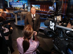Mayoral candidate Doug Ford answers  the media's questions after  the debate. Toronto Mayor's debate at CTV station  in Toronto, Ont. on Wednesday October 22, 2014. Craig Robertson/Toronto Sun/QMI Agency
