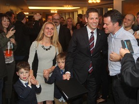 Winnipeg Mayor elect Brian Bowman enters his capping part with his wife Tracy and sons Austin and Hayden in Winnipeg, Man. Wednesday October 22, 2014.
Brian Donogh/Winnipeg Sun/QMI Agency