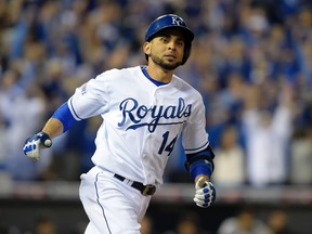 Royals second baseman Omar Infante reacts after hitting a two-run home run against the Giants during the sixth inning of Game 2 of the World Series in Kansas City on Wednesday, Oct. 22, 2014. (Christopher Hanewinckel/USA TODAY Sports)