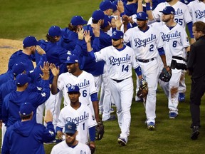 The Kansas City Royals celebrate their win over the San Francisco Giants in Game 2 of the World Series on Oct. 22. (USA Today Sports)