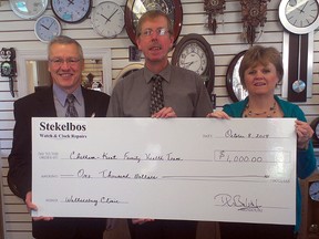 Dick Bulsink, centre, owner of Stekelbos Watch & Clock Repairs, donates $1,000 to go towards the fundraising efforts of the Chatham-Kent Family Health Team for the Wallaceburg Community Medical Centre expansion. Accepting the donation are Jeff Wesley and Laura Johnson, executive director for the Chatham-Kent Family Health Team. In May, Bulsink pledged to donate $1 from every watch battery he installed at his business. The expansion is needed to accommodate two new doctors. The Chatham-Kent Family Health Team, said they have raised $150,000 of the $200,000 fundraising goal.