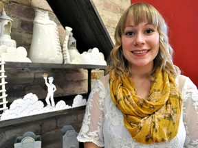 Local artist Kaitlyn McGill, the first artist-in-residence at the London Clay Art Centre, stands near her new exhibition “Kingdom Come” at the centre’s Dundas Street location October 22, 2014. CHRIS MONTANINI\LONDONER\QMI AGENCY