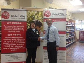 LCBO manager JoAnn Mann and United Way Cochrane – Timiskaming Board Vice President, Bill Greenburg pose at the Cochrane LCBO during this year's kick off for the United Way fundraising goal of $8,000 for the Cochrane area.