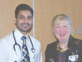 Dr. Laurel Moore (R) welcomes Dr. Yad Dhillon (L) to the HPHA.