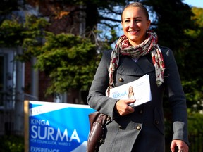 Kinga Surma, Ward 5 candidate, canvasses along Park Lawn in Toronto on Sunday October 19, 2014. (Dave Abel/Toronto Sun)