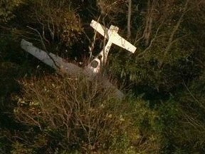 The wreckage of a Cirrus SR 22 airplane is shown in this handout photo courtesy of WBAL-TV/SkyTeam11, near Frederick Municipal Airport in Frederick, Maryland October 23, 2014. REUTERS/WBAL-TV/Skyteam11/Handout via Reuters