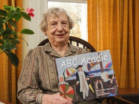 Kingston's Mary Alice Downie has written a new book, ABC Acadie. (Julia McKay/The Whig-Standard)