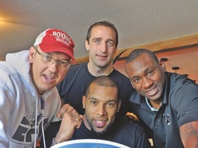 Eric Martel Bahoeli (centre, bottom) will defend the Canadian heavyweight title on Saturday. (QMI AGENCY)
