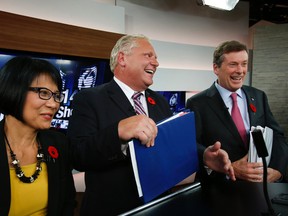 Olivia Chow, John Tory and Doug Ford at City TV for the final debate before Monday's municipal election on Thursday, October 23, 2014. (Stan Behal/Toronto Sun)