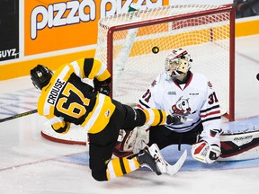 Kingston Frontenacs forward Lawson Crouse watches  a power-play goal by teammate Spencer Watson get past Niagara IceDogs goalie Brent Moran during OHL action at the Meridian Centre in St. Catharines on Thursday night.(Bob Tymczyszyn/QMI Agency)