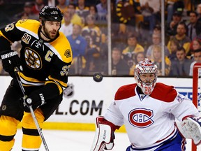 Montreal Canadiens goalie Carey Price (31) and Boston Bruins defenceman Zdeno Chara (33) eye a loose puck during Game 7 of their second-round playoff series at TD Garden. (Winslow Townson/USA TODAY Sports)