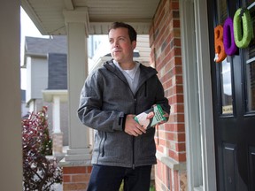 Ward 14 council candidate Jared Zaifman knocks on a door along North Leaksdale Circle while campaigning in London on Wednesday October 22, 2014.  Londoners will join the rest of the province as they head to the polls on Monday to elect a new city council. (CRAIG GLOVER, The London Free Press)