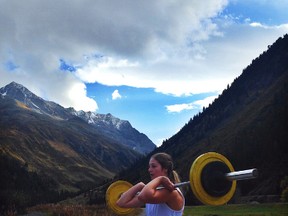 Jocelyn McCarthy lifts weights in the mountains as part of her training on the Canadian National Development ski team in preparation for race season. - Photo Supplied by Jocelyn McCarthy