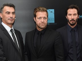 Directors Chad Stahelski and David Leitch, and actor Keanu Reeves attend the John Wick New York Premiere. Jamie McCarthy/Getty Images/AFP