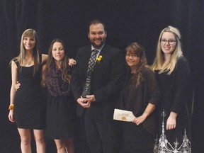 Randy Dimitrukowich, owner of Simply Health in Spruce Grove, was all smiles alongside his dedicated staff after his business was named the 2014 Business of the year by the Spruce Grove and District Chamber of Commerce. The award was given during the annual chamber gala, held on Oct. 18.