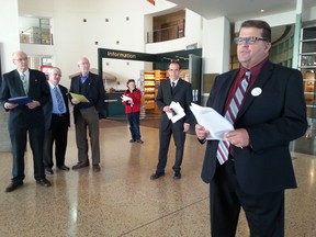 College ward candidate Guy Annable and his supporters at City Hall on Friday, Oct. 24, 2014 talk about their wish to have commuter trains to Kanata on an existing rail line. JON WILLING/OTTAWA SUN