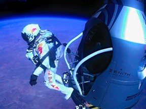 Pilot Felix Baumgartner of Austria jumps out of the capsule during the final manned flight for Red Bull Stratos in Roswell, New Mexico on October 14, 2012. On Friday, Google senior executive, Alan Eustace, secretly broke Baumgartner's record. FILE PHOTO