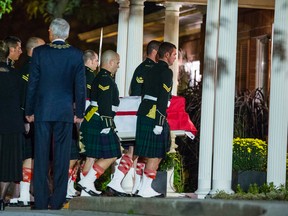 The casket of slain soldier Cpl. Nathan Cirillo is carried into the Markey-Dermody Funeral Home in Hamilton on Oct. 24, 2014. (Ernest Doroszuk/Toronto Sun)