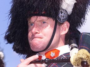 Glenn Healy plays bagpipes during events featuring the Argyll and Sutherland Highlanders, the slain Cpl. Nathan Cirillo’s regiment. (Toronto Sun files)