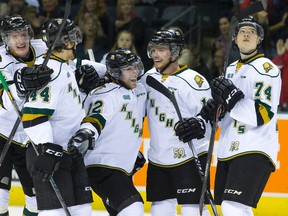 London Knights forward Aaron Berisha, centre, celebrates with his linemates after scoring one of his two first-period goals against the Ottawa 67?s at Budweiser Gardens on Friday. The Knights won 5-2. (CRAIG GLOVER, The London Free Press)