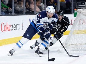 Both Blake Wheeler of the Jets and Kings' Mike Richards are on pace to obliterate their career highs in penalty minutes, though they're both likely not to keep up their early PIM pace. (AFP photo)