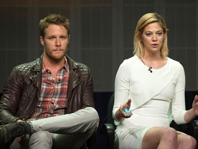 Cast member Analeigh Tipton speaks next to co-star Jake McDorman at a panel for the ABC television series "Manhattan Love Story" during the Television Critics Association Cable Summer Press Tour in Beverly Hills, California July 15, 2014. REUTERS/Mario Anzuoni