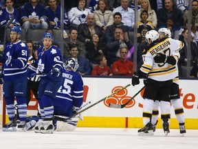 Boston players celebrate their opening goal against the Maple Leafs on Saturday night at the Air Canada Centre. (Michael Peake/Toronto Sun)