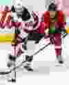 Ottawa Senators' Zack Smith battles with New Jersey Devils' Jaromir Jagr during NHL hockey action at the Canadian Tire Centre in Ottawa, Ontario on Saturday October 25, 2014. Errol McGihon/Ottawa Sun/QMI Agency