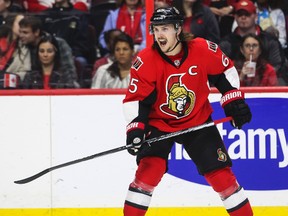 Ottawa Senators' captain Erik Karlsson shows some intensity as his team plays the New Jersey Devils in NHL hockey action at the Canadian Tire Centre in Ottawa, Ontario on Saturday October 25, 2014. Errol McGihon/Ottawa Sun/QMI Agency