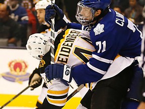 Maple Leafs' David Clarkson gets his stick up on Bruins' Dennis Seidenberg on Saturday night at the ACC. (MICHAEL PEAKE/TORONTO SUN)