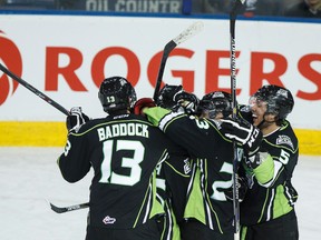 The Oil Kings celebrate forward Mitchell Walter's (36) goal against Prince George during the second period of a WHL game between the Edmonton Oil Kings and the Prince George Cougars at Rexall Place in Edmonton on Saturday, Oct. 25, 2014. Ian Kucerak/Edmonton Sun/ QMI Agency
