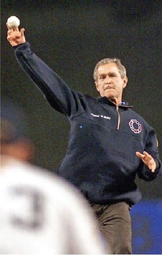 Yankee Stadium, 09/16/09: security guy searches a woman's …