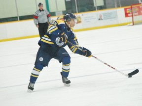 Laurentian Voyageurs' Brandon Francisco handles the puck during OUA men's hockey action at Gerry McCrory Countryside Sports Complex on Saturday.