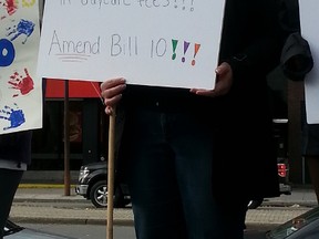 Angry independent daycare providers rallied at the Human Rights Monument on Sunday, Oct. 26, 2014 in opposition of Bill 10. 
KELLY ROCHE/OTTAWA SUN/QMI AGENCY