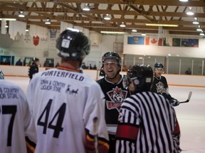 Hayden Shackel doesn't mince words as he takes exception to a hit from a Mustangs player in the second period. Greg Cowan photos/QMI Agency.