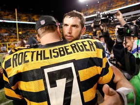 Ben Roethlisberger #7 of the Pittsburgh Steelers is congratulated by Andrew Luck #12 of the Indianapolis Colts after Pittsburgh's 51-34 win at Heinz Field on October 26, 2014 in Pittsburgh, Pennsylvania.   (Joe Robbins/Getty Images/AFP)