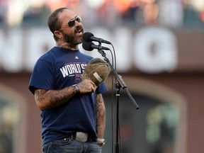 Aaron Lewis of Staind performs the U.S. national anthem before Game 5 of the World Series between the San Francisco Giants and the Kansas City Royals at AT&T Park. (Christopher Hanewinckel/USA TODAY Sports)